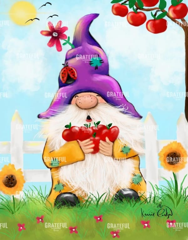 Gnome holding Apples In Garden