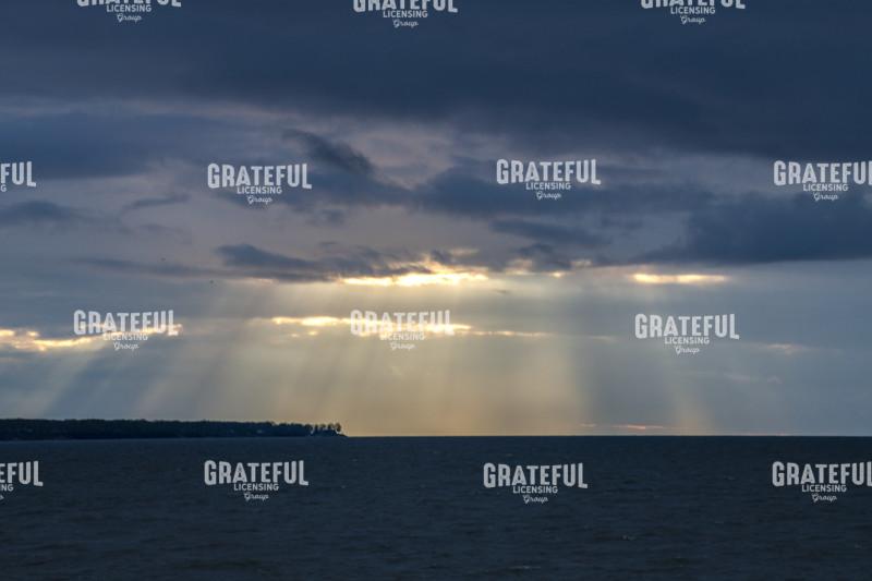 Rays of light on earth and water.tif