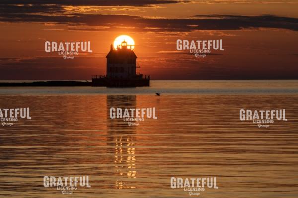 Lighthouse Sunset Reflections