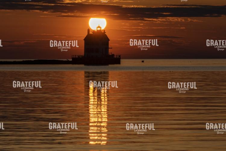 Sun Setting On The Lake Erie Lorain Lighthouse