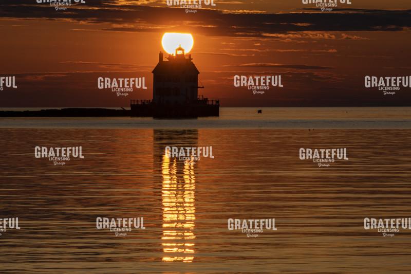 Sun Setting On The Lake Erie Lorain Lighthouse