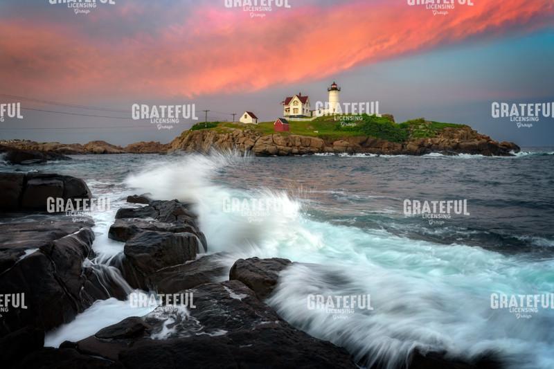 Rocky Shores and Radiant Skies