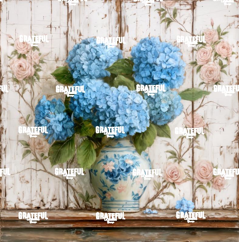 Blue Hydrangeas on a Shelf with Painted Rose Wall