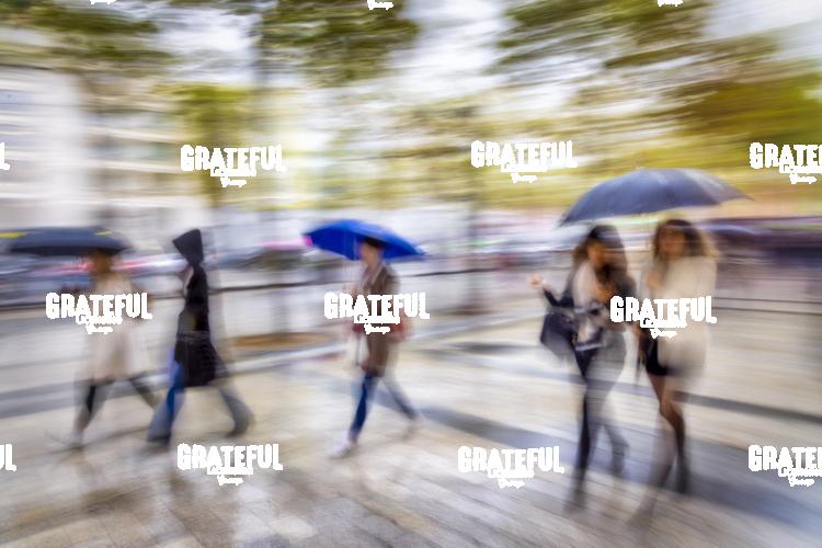 Women walking in the rain in Paris