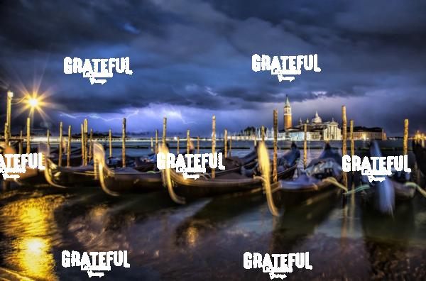 Gondolas and lightning in Venice Italy