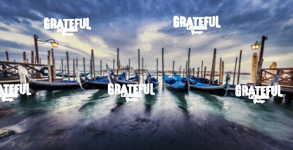 Sunset Panorama with Gondolas in Venice, Italy