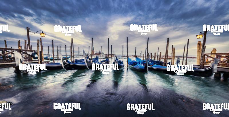 Sunset Panorama with Gondolas in Venice, Italy
