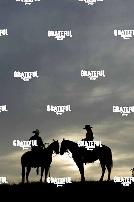 Cowboy and Cowgirl on the Plain