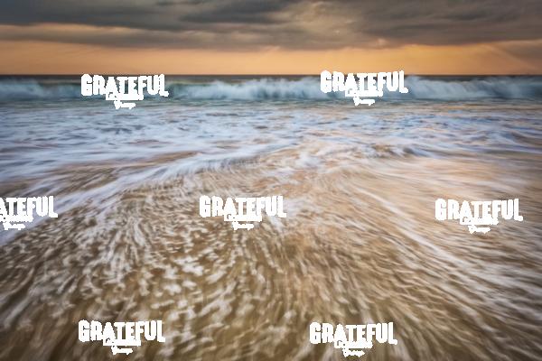 Sunset and waves crashing off the coast of Burma 2