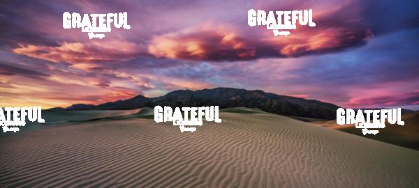 Clouds at sunrise in the Mesquite Sand Dunes at Death Valley National Park