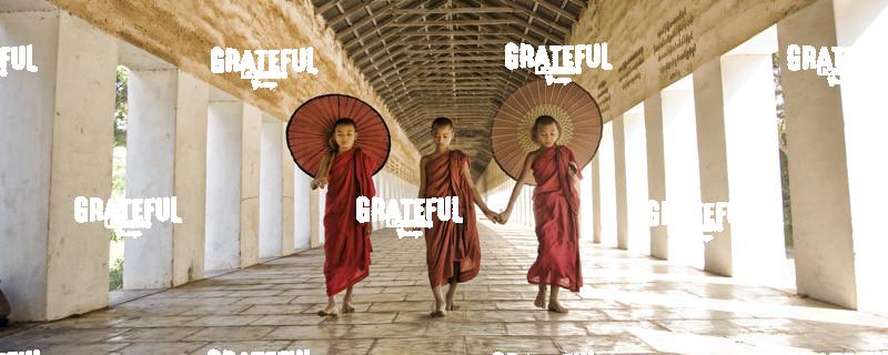 Monks with parasols in Mandalay, Burma 3