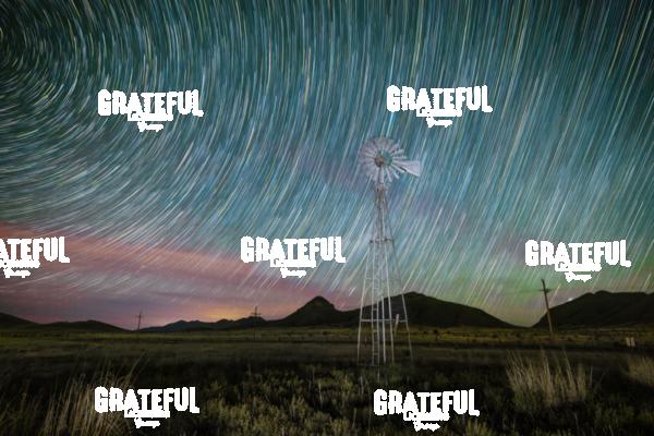 Windmill with colorful star trails in Arizona