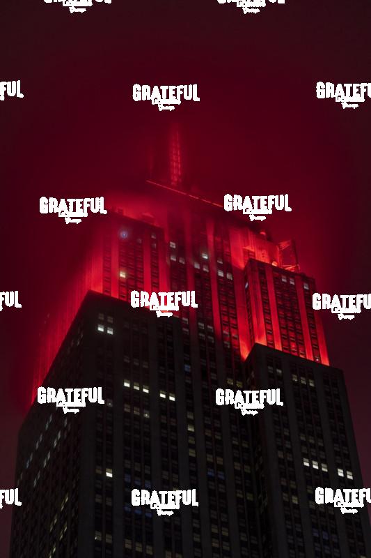 Empire State Building in fog in NYC