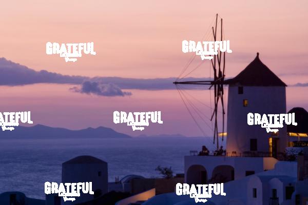 Windmill and Sunset in Santorini