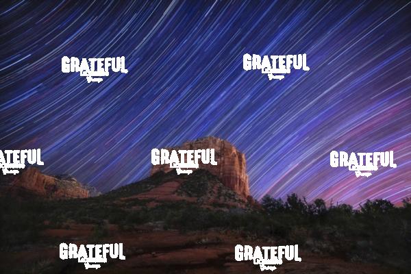 Star trails over Courthouse Rock in Sedona, Arizona