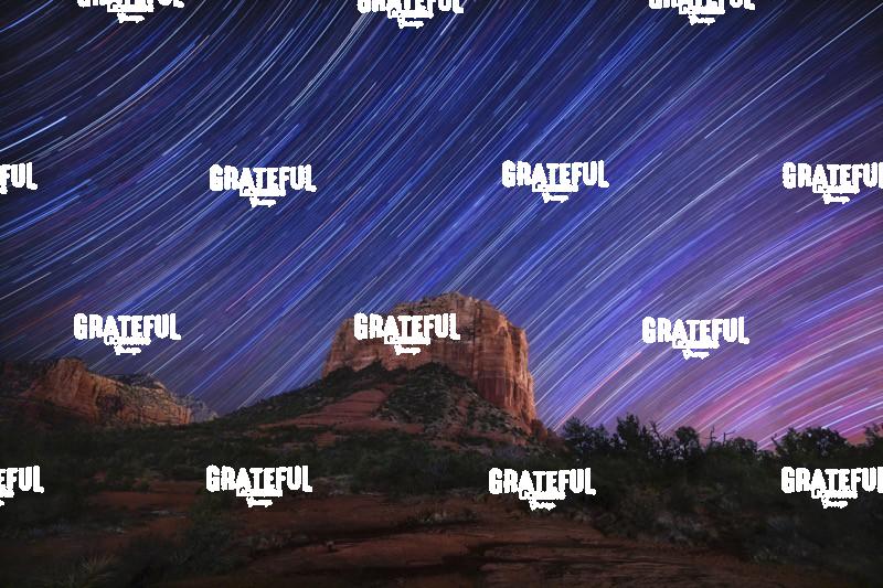 Star trails over Courthouse Rock in Sedona, Arizona