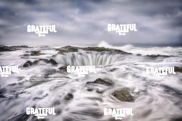 Waves crashing into Thors Well on the Oregon Coast 6