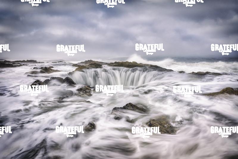 Waves crashing into Thors Well on the Oregon Coast 6