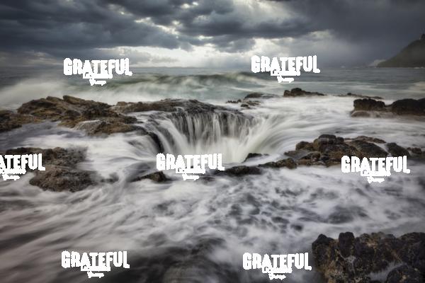 Waves Crashing into Thors Well on the Oregon Coast