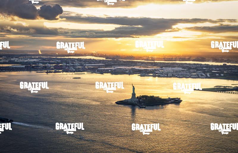 the Statue of Liberty at sunset from high above