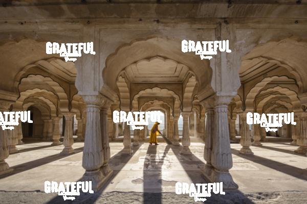 Woman sweeping in the Amber Fort in Jaipur, India