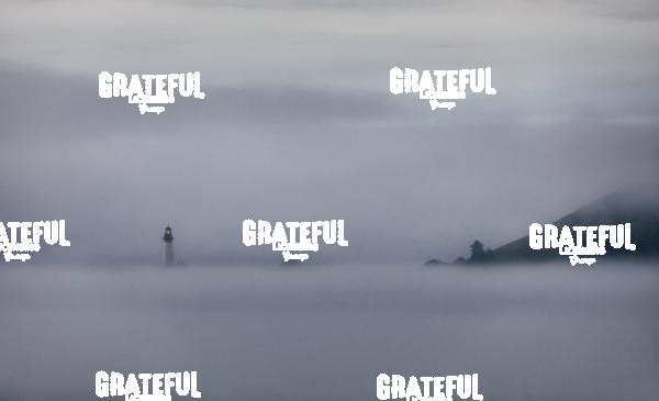 Yaquina Lighthouse in fog on the coast of Oregon