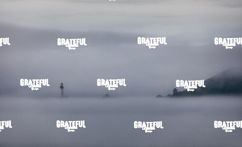 Yaquina Lighthouse in fog on the coast of Oregon