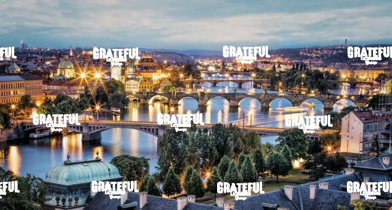 Panorama of Vltava River and bridges in Prague at sunset