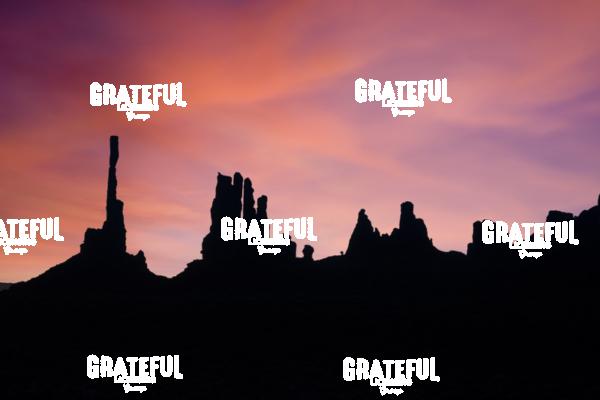 Sunrise at Totem Pole & Y’ei Bi Chei in Monument Valley, Utah