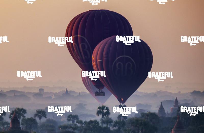 Hot air balloons over the temples of Bagan, Burma at sunrise