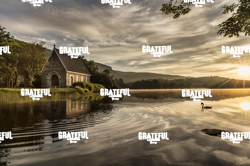 St Finbarr's Oratory church in Gougane Barra, Ireland at sunrise